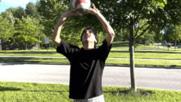Adarsh Patel volleying a volleyball
